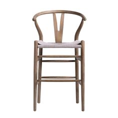 a wooden chair with a white seat on a white background and the back of it's arm