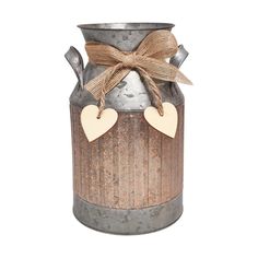 PRICES MAY VARY. Bring a rustic vibe to your home with this galvanized metal planter resembling a vintage milk can. Perfect for office or home décor Old-fashioned kettle designs allow it to blend with any room. Also perfect fit for adorning for garden spaces Height 8.8", Width 4.2", Bottom Diameter 5.3" It does not hold water Perfect for artificial flowers. In addition, this vase can also stand alone as a decorative piece PHILPETY is a innovative seller of home items. This original piece is care Vintage Milk Can, Boho Style Wedding, Flower Holder, Metal Planters, Metal Vase, Milk Cans, Galvanized Metal, Country Home Decor, Wedding Item