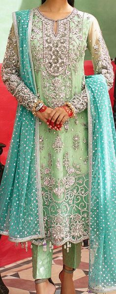 Product Description:  An exquisite ensemble of apple green and turquoise hues, including elaborate silver embroidery on net fabric, paired with our traditional chan dupatta and straight pants. Color: Green Can be customized in any color Includes:  Shirt Pants Duppata Elegant Green Churidar With Sheer Dupatta, Elegant Green Churidar For Reception, Green Churidar With Resham Embroidery For Reception, Green Salwar Kameez For Eid Reception, Green Floor-length Churidar For Reception, Green Anarkali Set With Dabka Work For Reception, Green Salwar Kameez With Sheer Dupatta For Reception, Elegant Turquoise Set With Dupatta, Elegant Floor-length Green Churidar