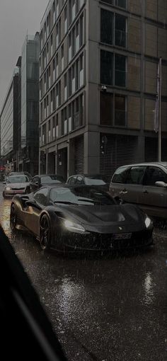 a car that is sitting in the rain