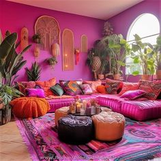 a living room filled with lots of colorful furniture and plants on top of the floor