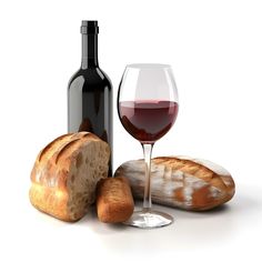 a glass of wine and some bread on a table