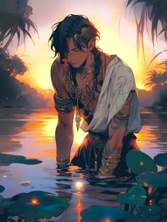 a person kneeling down in the water with lily pads on their feet and wearing jewelry