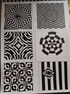 some black and white designs on a piece of paper