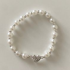 Nwot Faux Pearl Bracelet With Heart Charm. White Pearl Bracelets With Heart Beads, White Pearl Beaded Bracelets With Heart Beads, White Pearl Bracelet With Heart Beads, White Pearl Heart Bracelet As A Gift, White Pearl Heart Bracelet Gift, Elegant White Stretch Bracelet With Heart Beads, Adjustable White Hypoallergenic Heart Bracelet, Adjustable Hypoallergenic White Heart Bracelet, Cute White Beaded Heart Bracelet