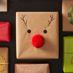 presents are wrapped in brown paper and decorated with reindeer's noses, nose and nose