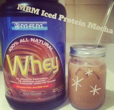 a bottle of whey next to a jar of chocolate ice cream