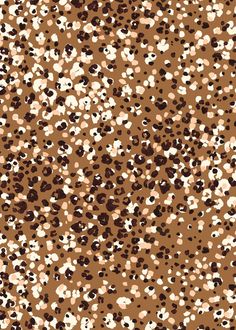 an animal print pattern with brown and white spots on the top, in various sizes