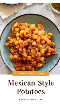 mexican style potatoes on a blue plate with salsa in the background and text overlay