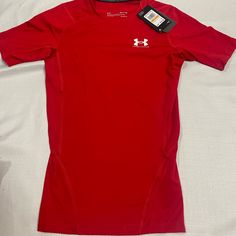 Nwt Under Armour Heatgear Short Sleeve Compression Shirt Red Men’s Small Under Armour Short Sleeve Workout Top, Short Sleeve Under Armour Workout Top, University Red Crew Neck Tops For Sports, Sporty Fitted Red T-shirt, Under Armour Sporty Shirt For Sports, Sporty Under Armour Sports Shirt, Sporty Under Armour Shirt For Sports, Sporty Short Sleeve Tops By Under Armour, Red Crew Neck Sports Top