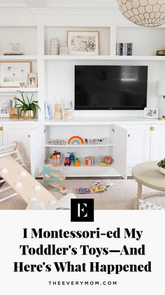 a white entertainment center with shelves and toys