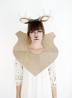 a woman with deer antlers on her head