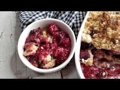 two bowls filled with food sitting next to each other