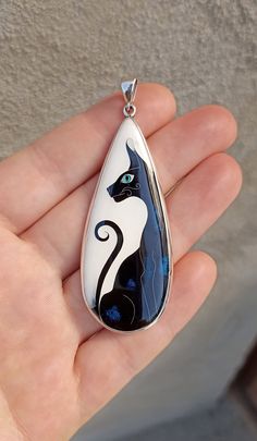 Handmade cloisonne enamel pendant. Sterling silver setting Size: 6.2cmX 2.2cm + bail 1 cm Cat Design Pendant Jewelry, Egyptian Cat, Cat Pendant, Cat Pendants, Cloisonne Enamel, Jewelry Sterling Silver, Animal Jewelry, Sterling Silber, Silver 925