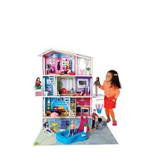 the doll house is full of furniture and toys for children to play with in it