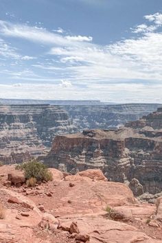 a man standing on the edge of a cliff