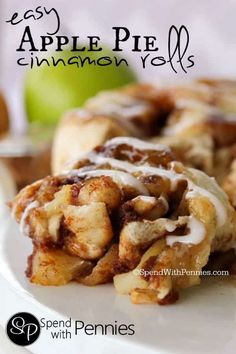 an apple pie cinnamon roll on a white plate