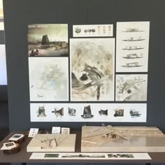 a table with some drawings and pictures on it