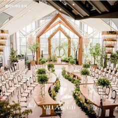 an indoor wedding venue with tables and chairs