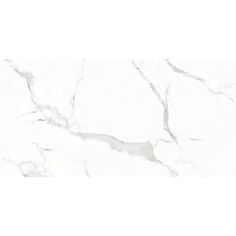 a white marble tile wall that looks like it is being used as a background