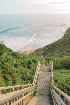 stairs lead down to the beach and ocean