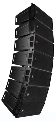 several black speakers stacked on top of each other