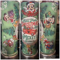 three christmas themed tumblers sitting on top of a counter