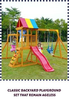 a wooden swing set with a pink slide and yellow swingset in the back ground