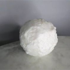 a white object sitting on top of a table