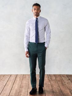 Elegant Green Suit With Pressed Crease, Elegant Green Slim Fit Suits, Festive Elegant Workwear Suits, Elegant Tailored Dark Green Suit, Elegant Green Formal Suit, Green Fitted Evening Suit, Green Evening Suits With Notch Lapel, Green Evening Suit With Notch Lapel, Elegant Fitted Dark Green Suits