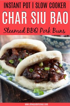 two small sandwiches on a blue and white plate with text that reads instant pot i slow cooker char su bao steamed bbq pork buns