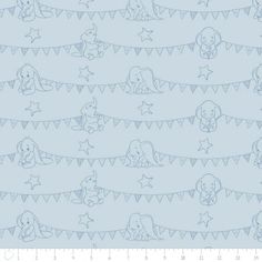 a blue fabric with dogs and stars on it, as well as a line drawing