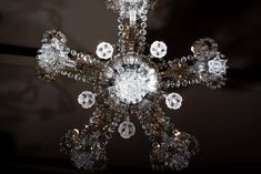 a crystal chandelier hanging from the ceiling