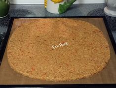 a round cake sitting on top of a counter