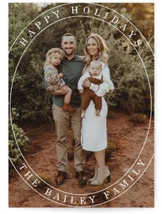 a family photo with the words happy holidays on it and an image of two people holding their children