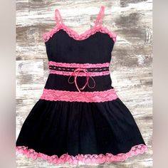 Betsey Johnson Vintage Black Dress With Pink Lace Accents. 100% Cotton With Lace Adjustable Straps. Woman’s Size Petite. Please Note, This Is A Vintage Piece From The Early 2000s!! It Is Super Sexy And Cute!! Pink Coquette Mini Dress With Lace Trim, Pink Coquette Dress For Night Out, Coquette Pink Dress For Night Out, 2000s Dresses, Early 2000s Dresses, Pink Lace Dress, Vintage Black Dress, Lace Pink Dress, Betsey Johnson Dresses