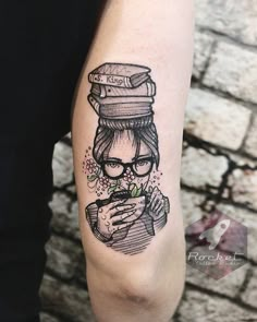 a person with a tattoo on their arm