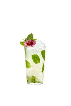 a tall glass filled with ice and green leaves, topped with a pink flower on top