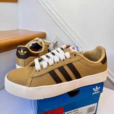 Brand New In Box. Tags Attached. Never Worn. Adidas X Noah Adria Shoes In Golden Beige ( Golbei ), Core White, And Gold Metallic. Mens Size 4.5 Msrp: $100 + Tax , Price Is Firm. “The Thing Is, Noah Fans Were Already Wearing Adidas. That's To Say 'The Shoe Fits'. Their Classic Designs Easily Compliment Street Fashion, Prep, And Athletic Wear - All Touchstones Of Noah's Growingly Distinguished Brand Identity. So When The Two Fixtures In Their Field Pair Up, It's Effortless. Proving That Less Is Mo Sporty Brown Canvas Shoes For Streetwear, Sporty Brown Low-top Canvas Shoes, Brown Skate Shoes With Rubber Waffle Outsoles, Brown Canvas Shoes With Rubber Sole For Streetwear, Brown Canvas Shoes With Round Toe For Streetwear, Brown Low-top Canvas Shoes, Brown Canvas Shoes With Round Toe, Brown Canvas Round Toe Shoes, Sporty Brown Canvas Shoes With Round Toe