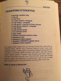 an open recipe book with instructions on how to make crawfish eoutfe