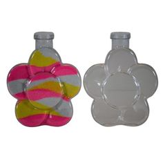 two glass bottles with flower designs on the top and bottom, one is pink and yellow