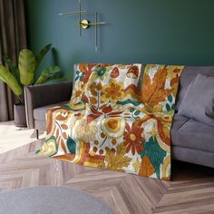 a living room with a couch, coffee table and potted plant