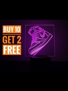 a neon sign that says buy 10 get 2 free with an image of a shoe on it