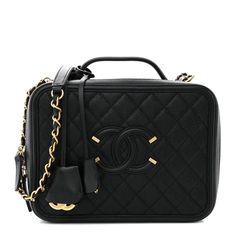 This is an authentic CHANEL Caviar Quilted Large CC Filigree Vanity Case in Black. This chic stylishtravel bag is crafted of luxurious diamond quilted caviar leather in gold. This elegant shoulder bag featuresan gold chain link leather threaded shoulder strap and a large Chanel CC stitched logo on the front. The two zippers open all around to a partitioned black leather interior with card slots, zipper and flat pockets with a holder for the mirror. Stylish Travel Bag, Chanel 19, Quilting Frames, Denim Quilt, Vanity Case, Heart Bag, Chanel Caviar, Leather Thread, Diamond Quilt