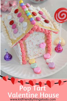 a paper plate with a candy house on it and the words pop tart valentine's day house