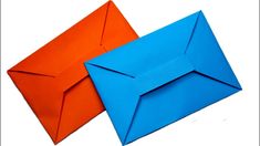 two origami envelopes sitting next to each other