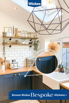 an image of a kitchen with blue cabinets and white tile on the walls, above which is a skylight