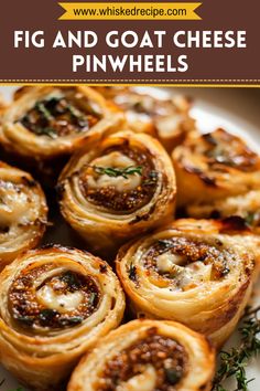 a white plate topped with mini cheese pinwheels