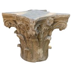 an old stone table with carvings on the top and bottom, against a white background