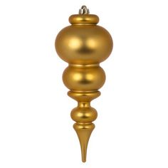 a gold christmas ornament hanging from a metal pole on a white background with clippings